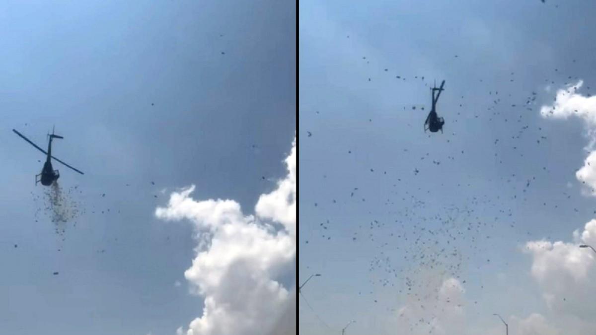 拿著床單去撿錢！ 底特律街頭突降「鈔票雨」 撒錢背後原因曝光